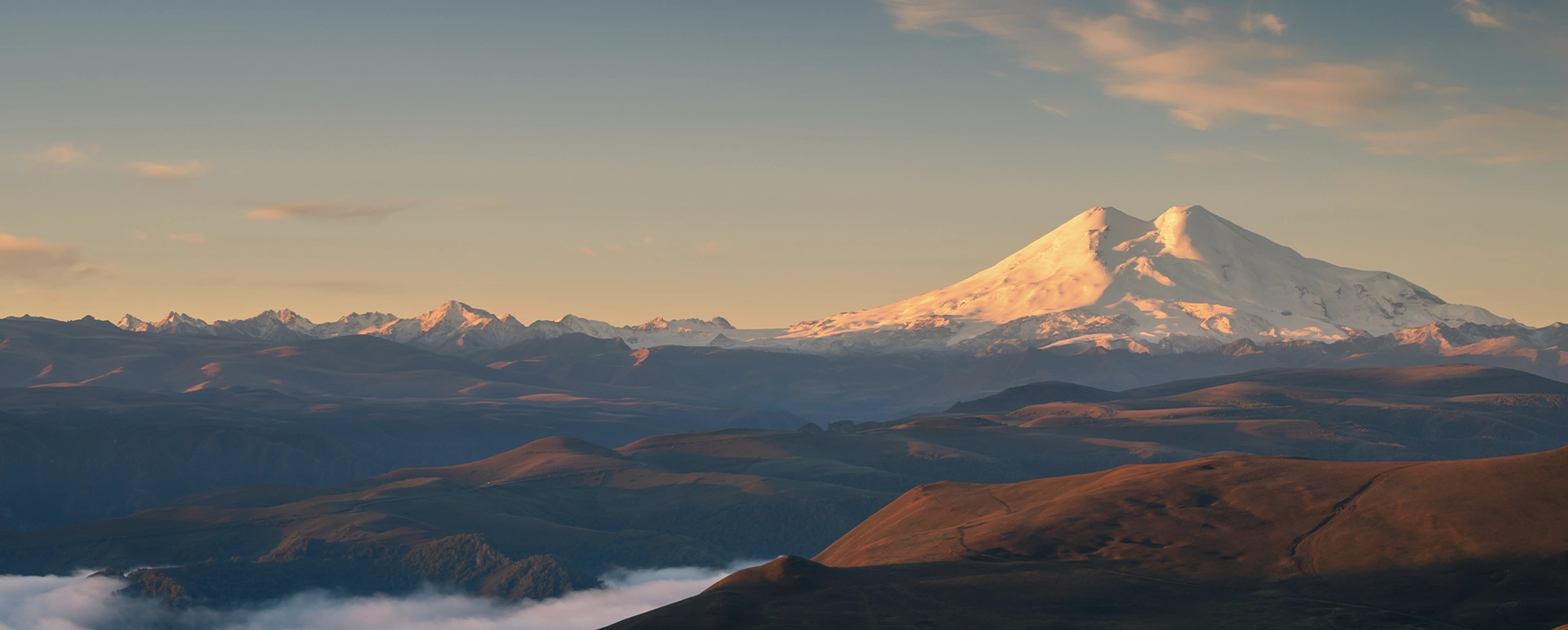 Mount Elbrus twin summits glowing at sunrise