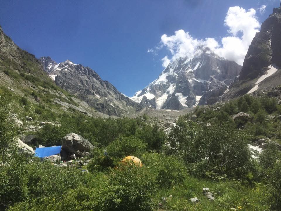 The Chaukhi massif rising above a mountain camp in Georgia